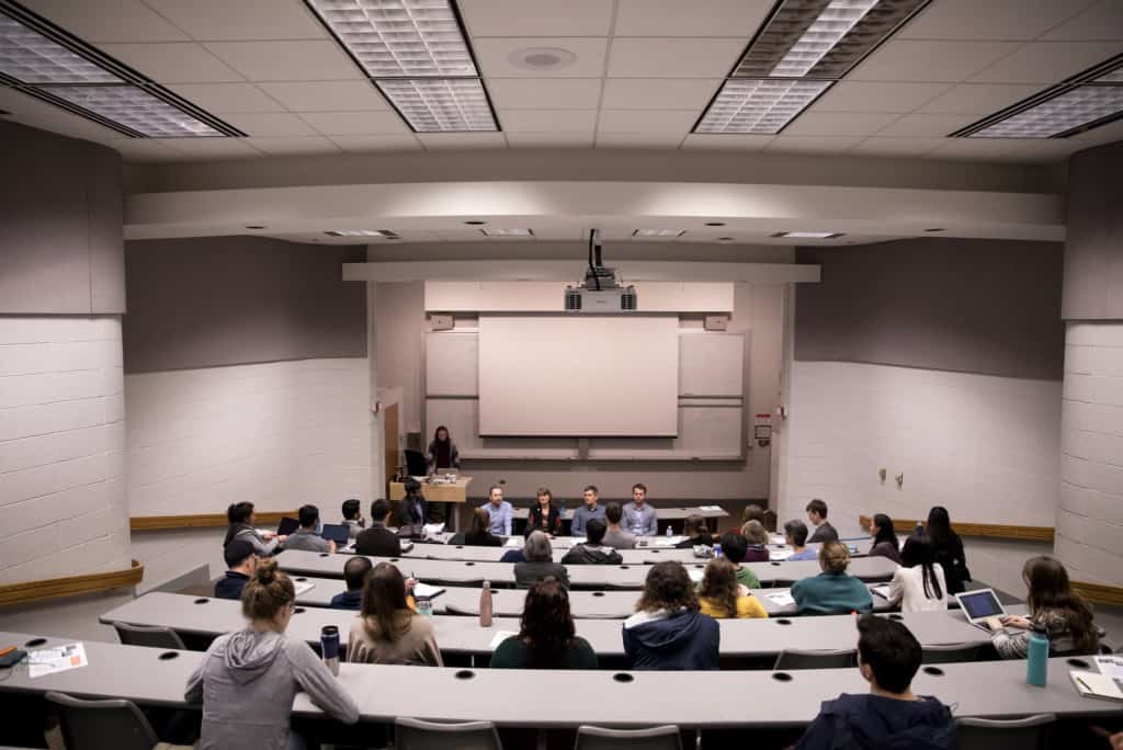 an auditorium filled with people