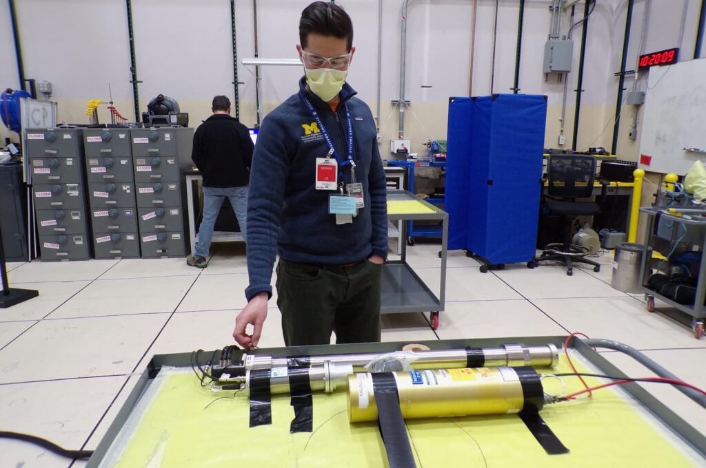 Oskar Searfus standing in the lab